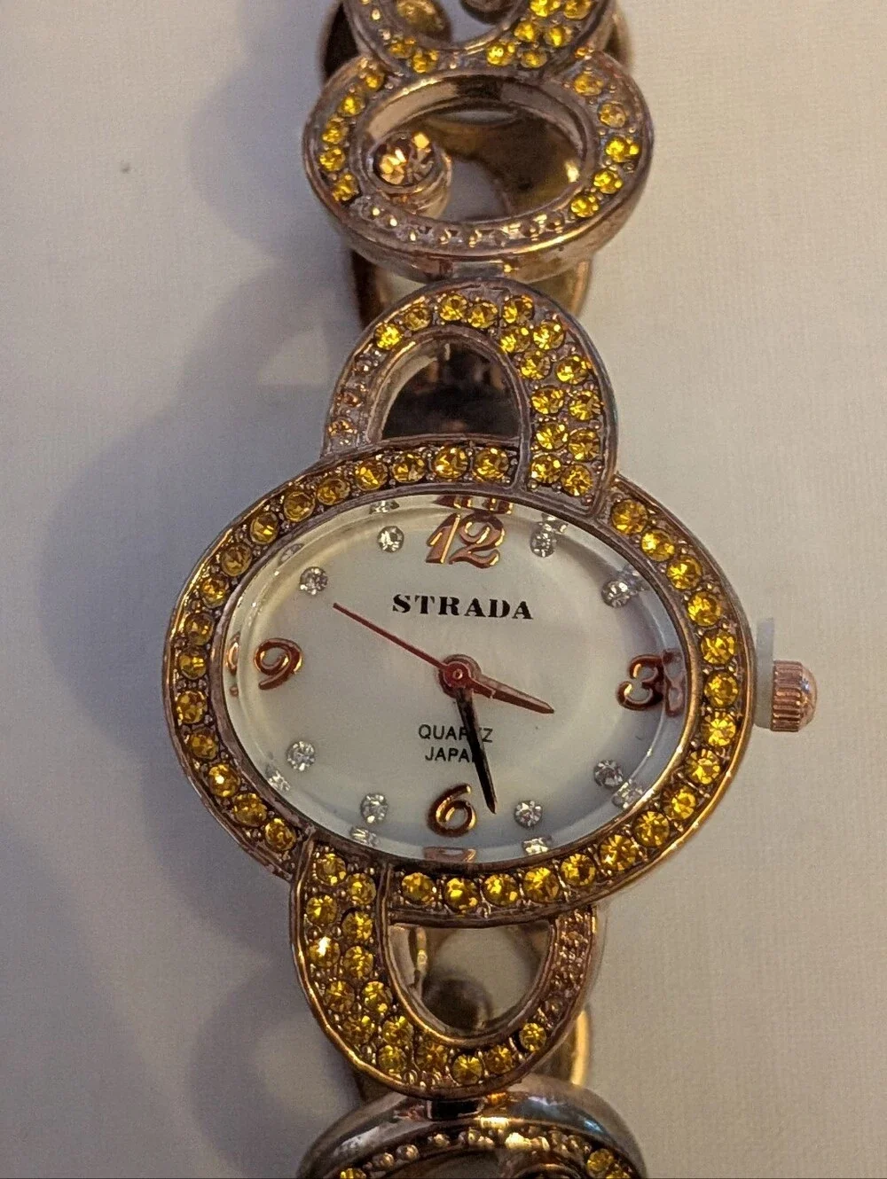 Strada Rose Tone Metal Women's Bracelet Watch with Sparkling Accents